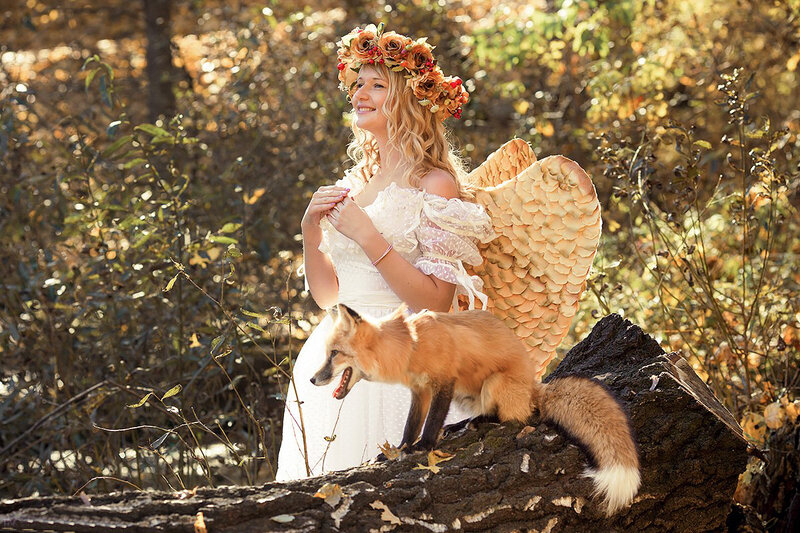 Woman with Fox and Wings