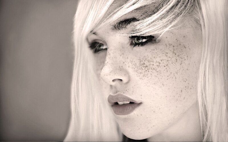 woman with freckles and blonde hair