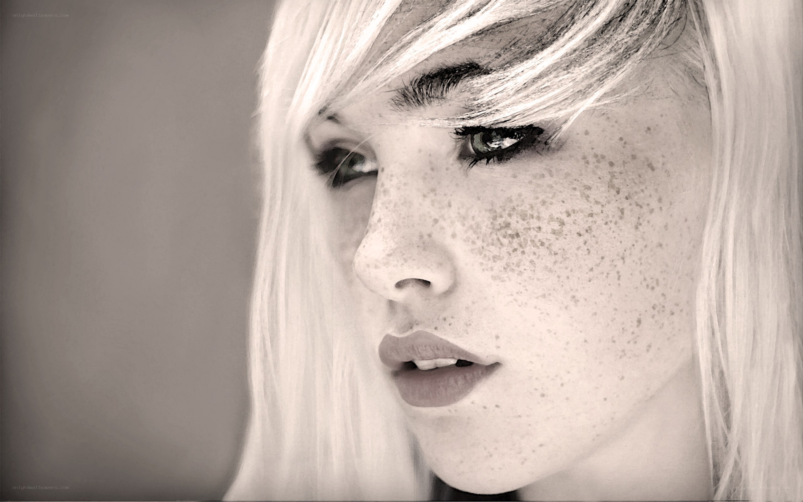 woman with freckles and blonde hair
