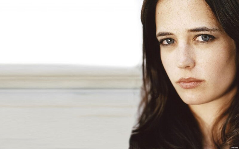 woman with freckles and blue eyes