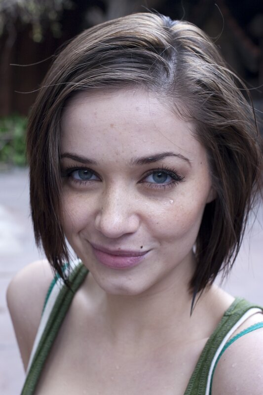 woman with freckles and blue eyes