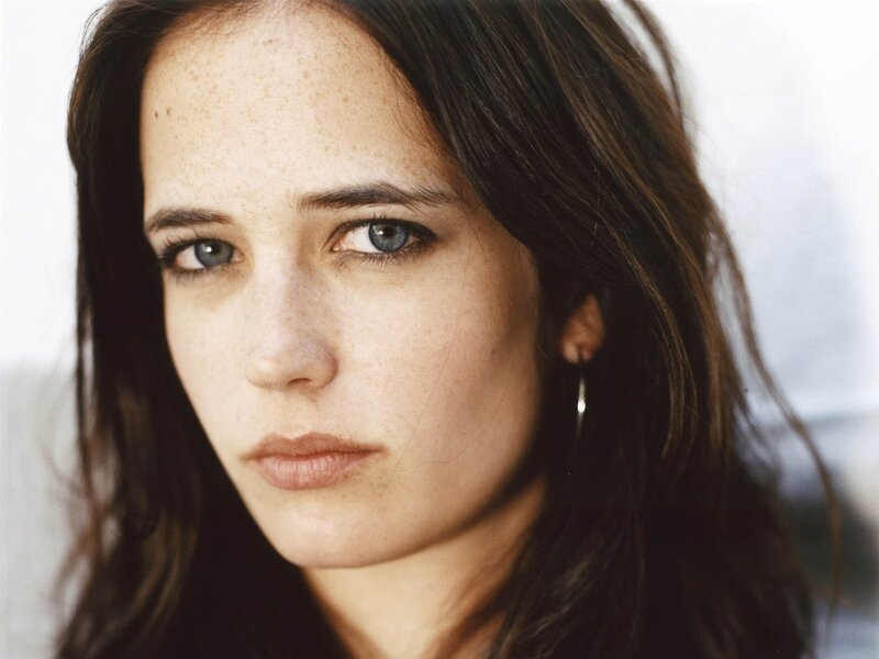 woman with freckles and blue eyes
