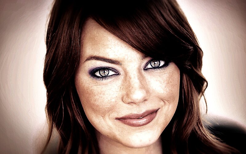 woman with freckles and blue eyes