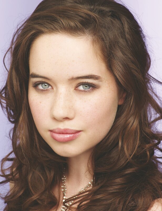 woman with freckles and blue eyes