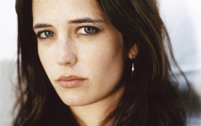 woman with freckles and blue eyes