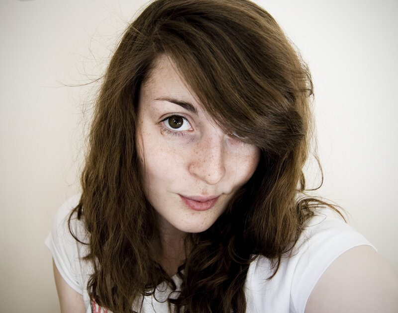 woman with freckles and brown hair