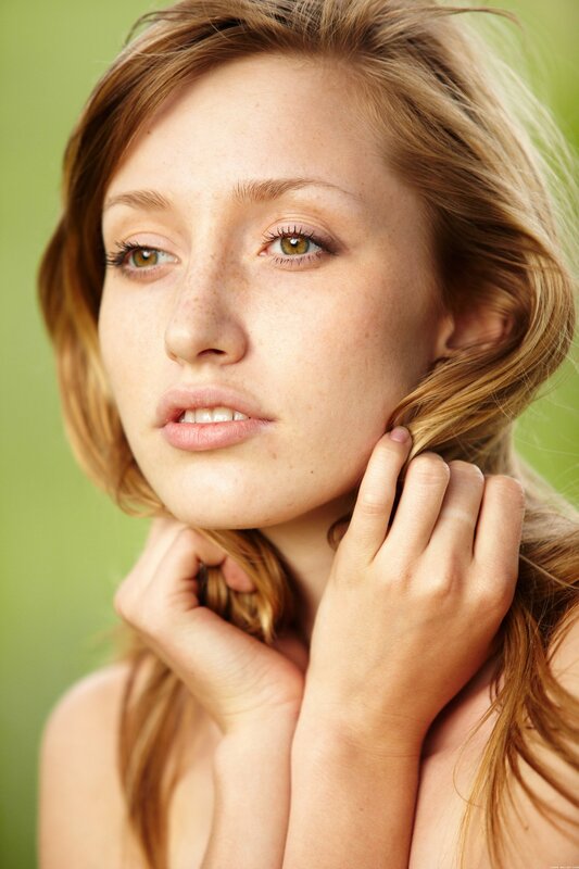 woman with freckles and green eyes