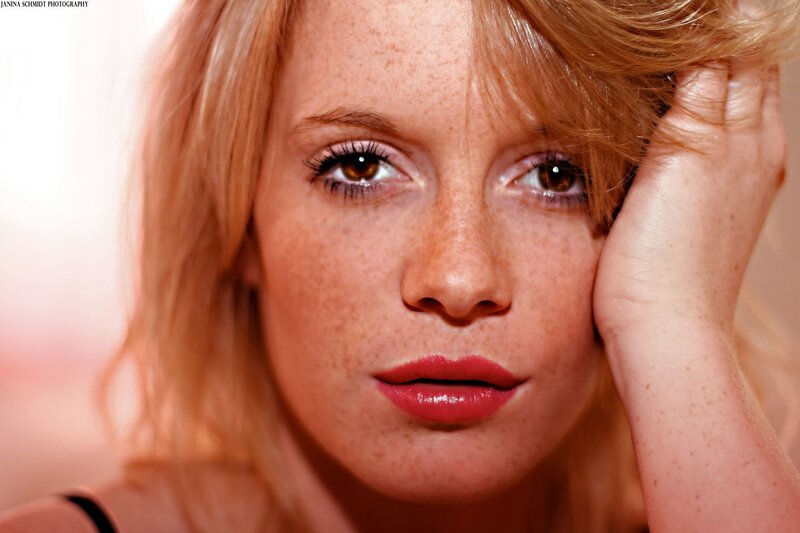 woman with freckles and red hair