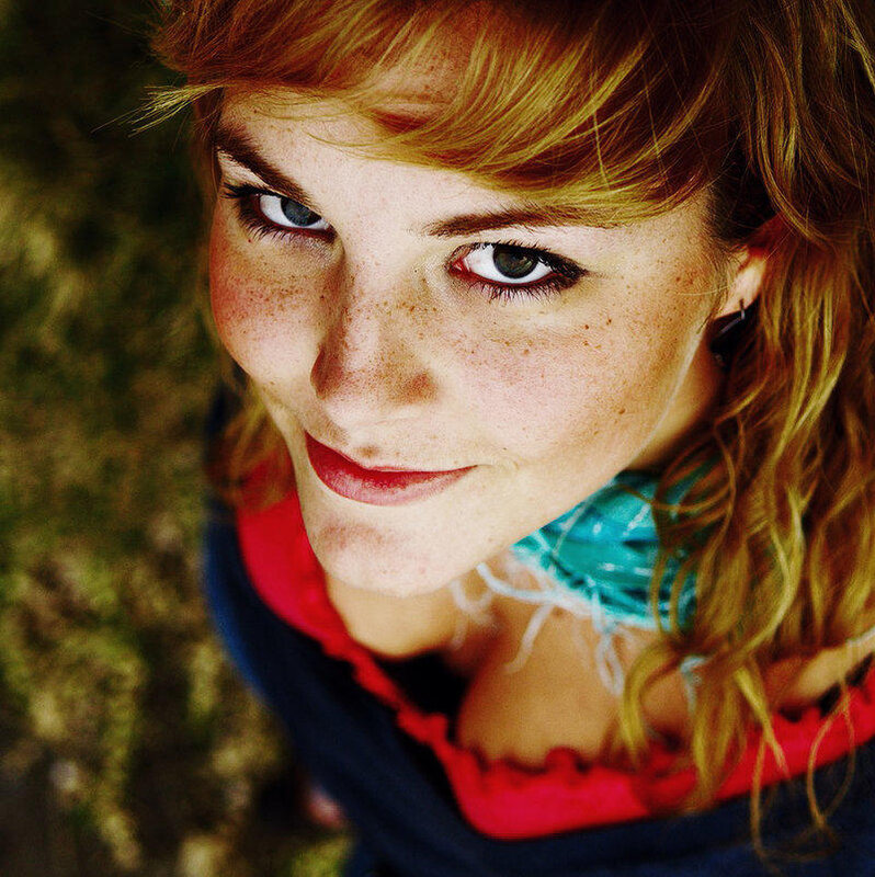woman with freckles and red hair