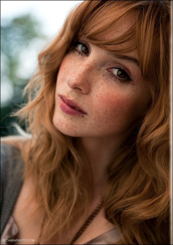 woman with freckles and red hair