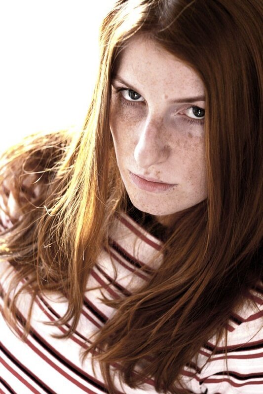 woman with freckles and red hair
