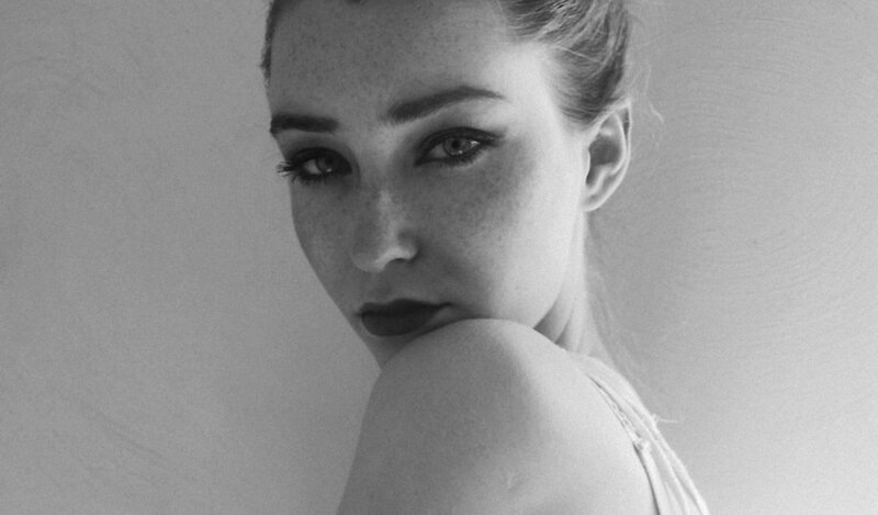 Woman with Freckles — Black, Serious, Photograph, Shoulder