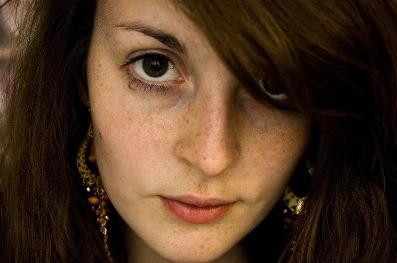 Woman with Freckles — Brown, Intense, Photograph, Earrings