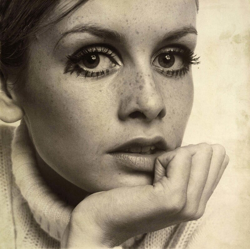 woman with freckles in black and white