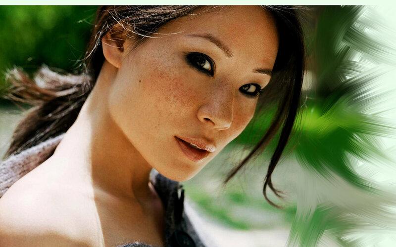 woman with freckles in nature