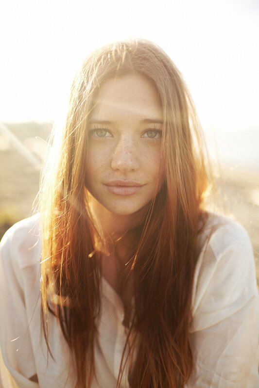 woman with freckles in sunlight