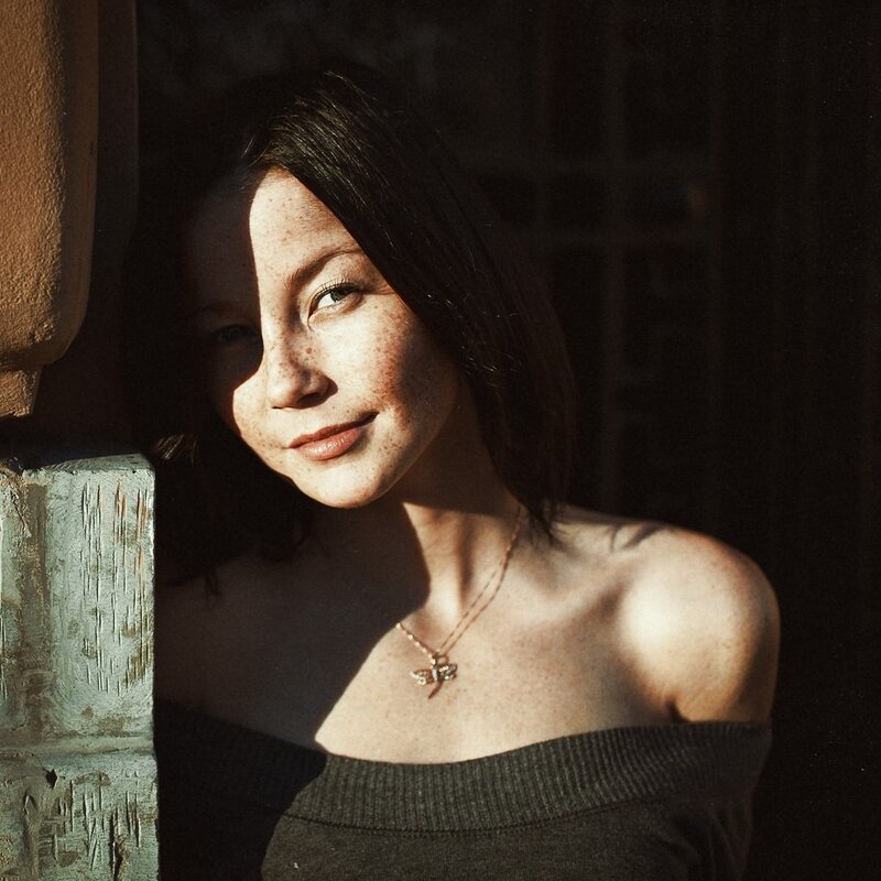 woman with freckles in sunlight