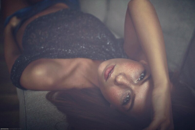 Woman with Freckles Lying — Gray