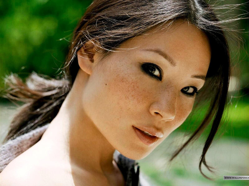 woman with freckles outdoors