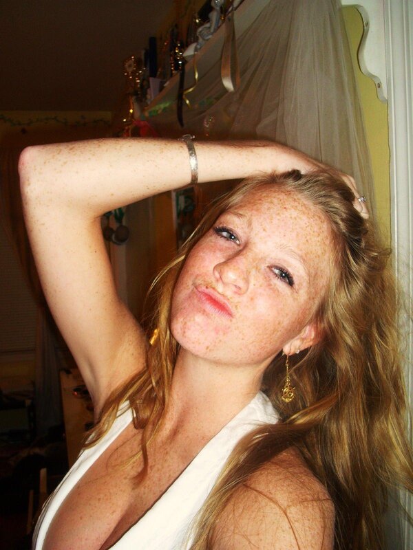 woman with freckles posing