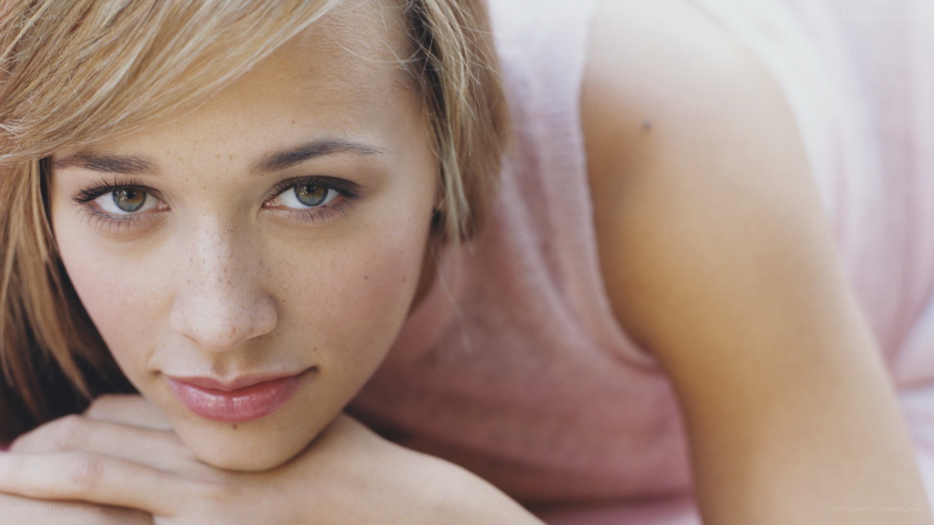 woman with freckles resting