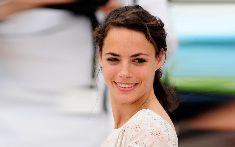 Woman with Freckles Smiling — White