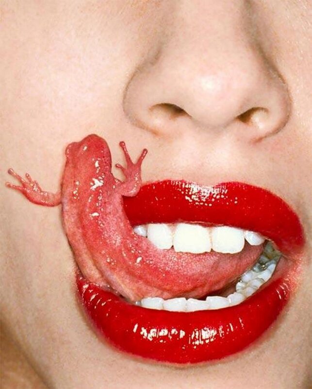 woman with frog on face