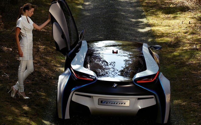 woman with futuristic car