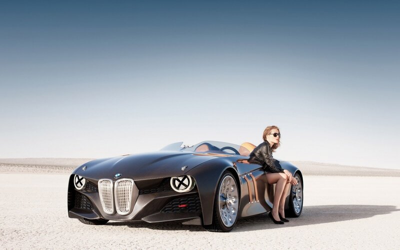 Woman with futuristic car