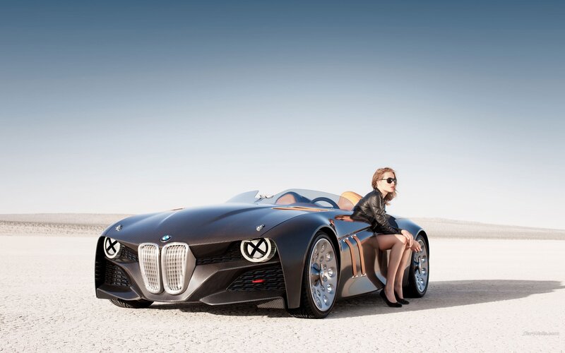 Woman with futuristic car