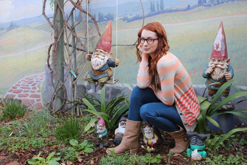 Woman with Garden Gnomes — Red