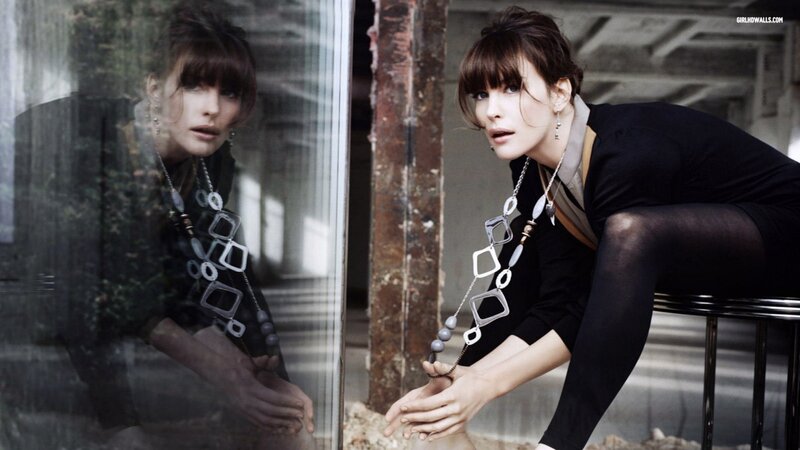 woman with geometric necklace