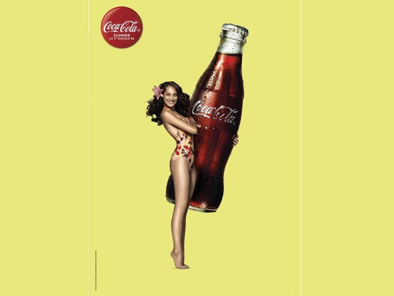 Woman with giant coca-cola bottle