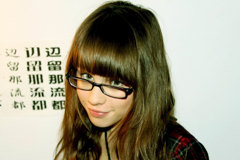 woman with glasses and bangs