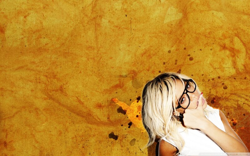 woman with glasses and blonde hair