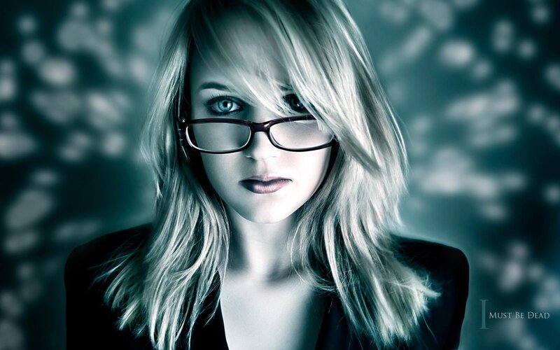 woman with glasses and blonde hair
