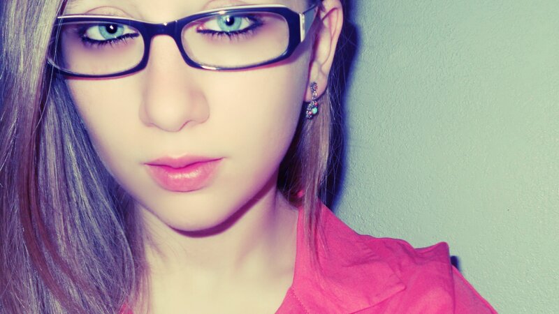woman with glasses and blue eyes