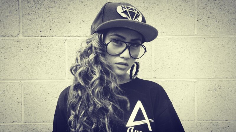 woman with glasses and cap