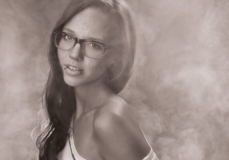 woman with glasses and freckles