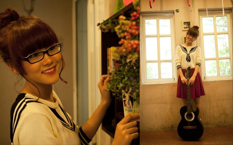 woman with glasses and guitar