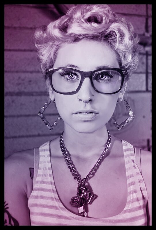woman with glasses and piercings