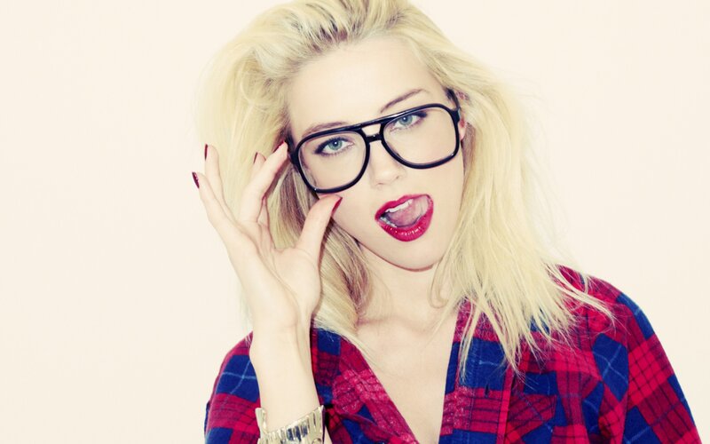 woman with glasses and red lipstick