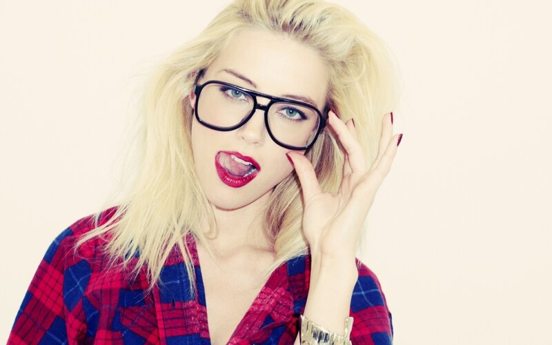 woman with glasses and red lipstick