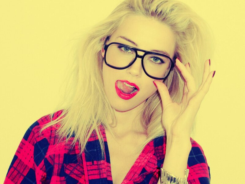 woman with glasses and red lipstick