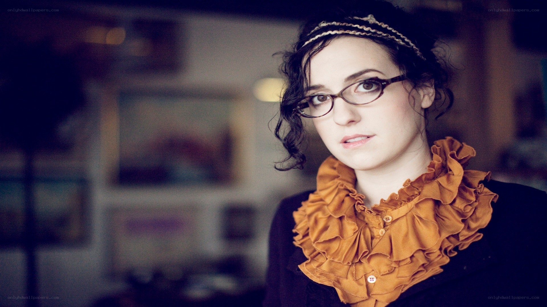 woman with glasses and ruffled collar