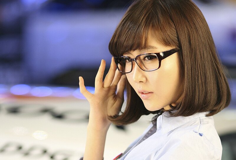 woman with glasses at event
