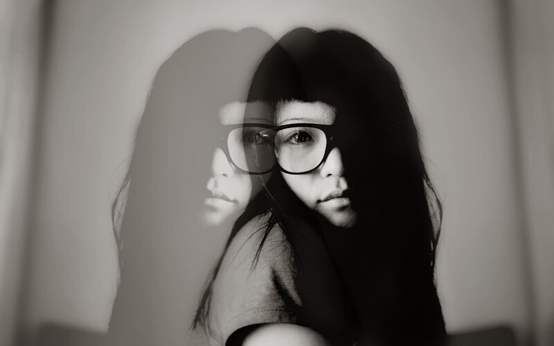 Woman with Glasses — Black, Dramatic, Photograph, Long Hair