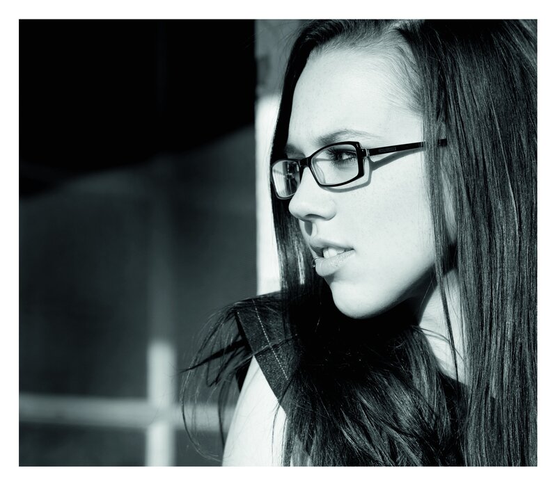 woman with glasses in profile