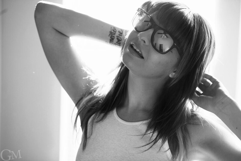 woman with glasses in sunlight
