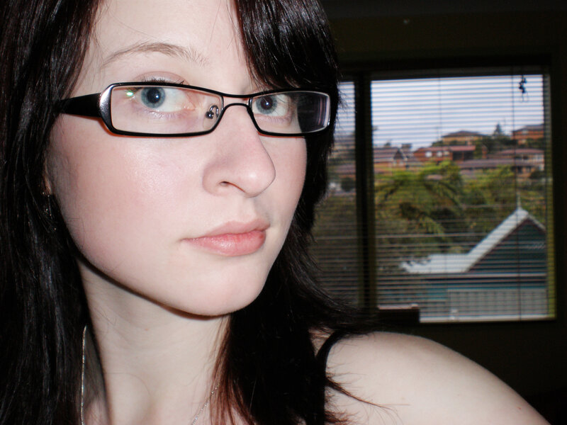 woman with glasses indoors